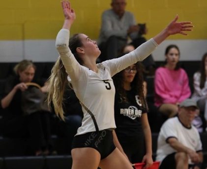 Sophomore CorleyAnn Rodgers serves the Hawks to a victory this past Friday against Vernon.