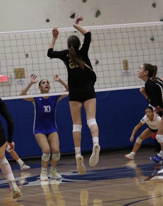 Sr. Julia Ryan outplays Demarest’s defense getting a kill and point for her team.