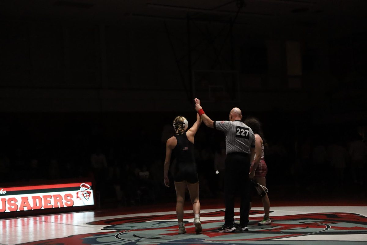 Jocelyn Danbe's hand raised in victory.